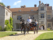 OpenDay visitors enjoy a carriage ride from Chawton House to the village